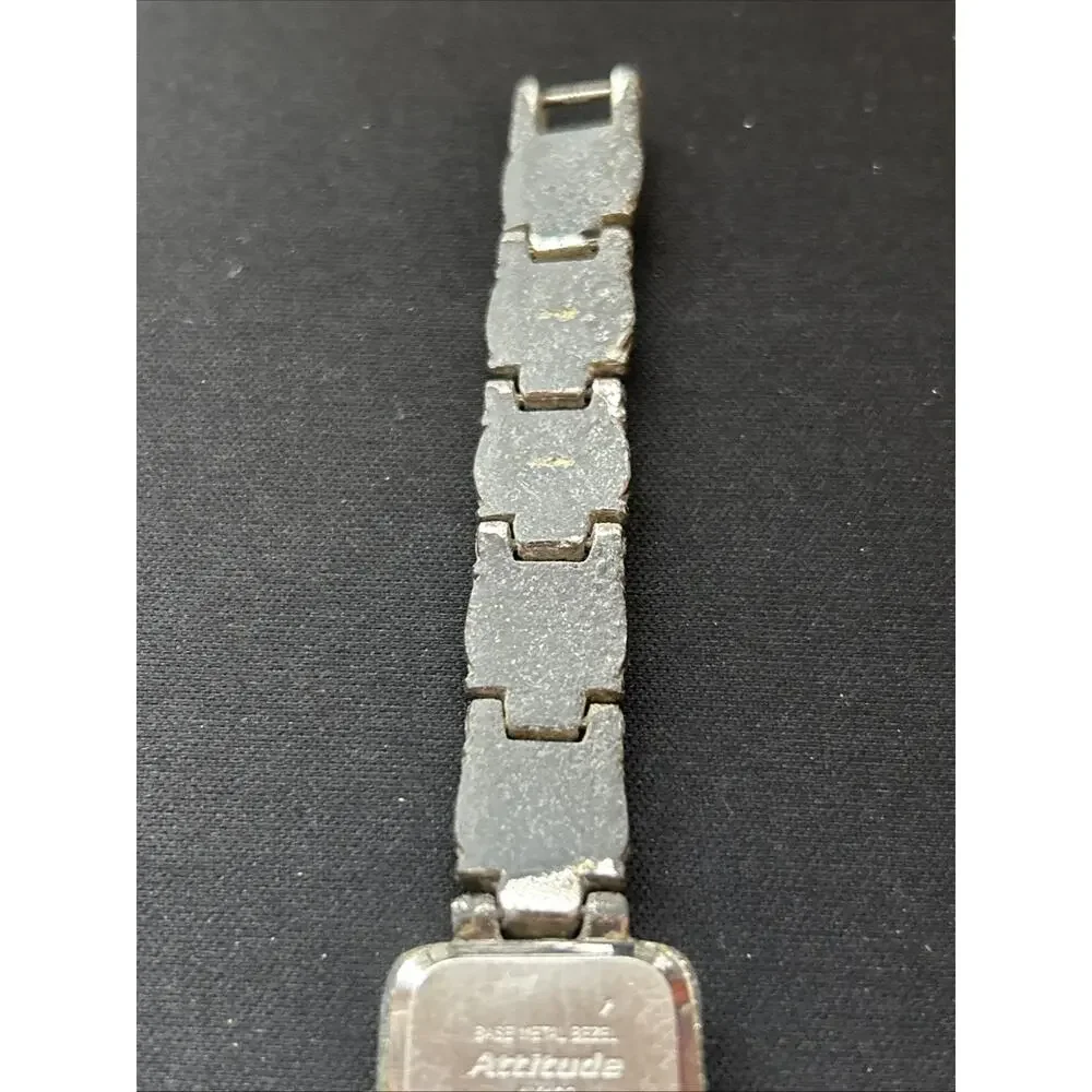 Attitude silver tone